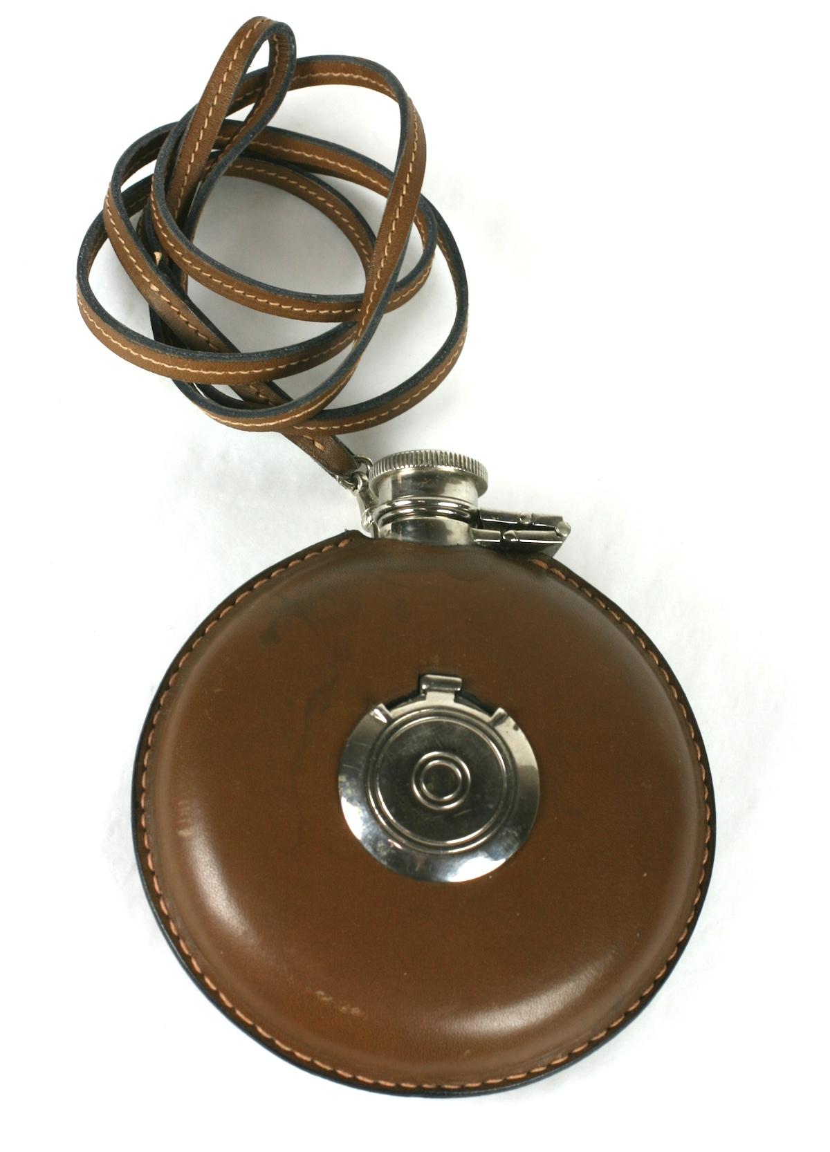 Gucci Leather Clad Flask from the 1970's with lariat to be worn as accessory.  Beautifully constructed of leather clad metal with screw off cap. Flask is detachable from lariat. Flask measures 4.25