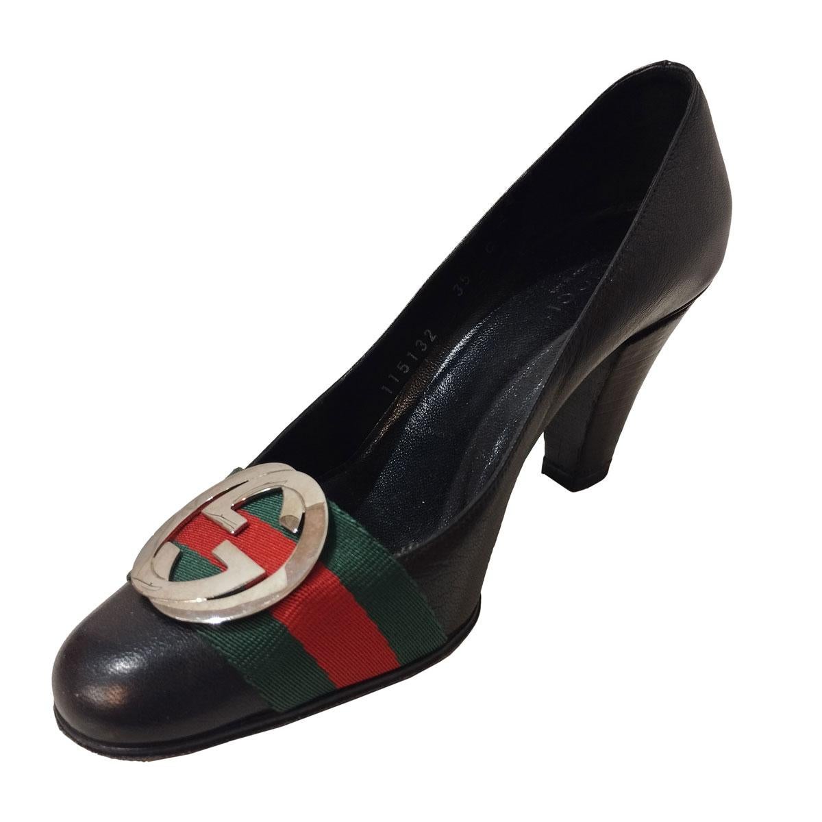Leather décolleté
Leather
Black color
GG metal buckle
Red and green band
Heel height cm 7 (2,75 inches)