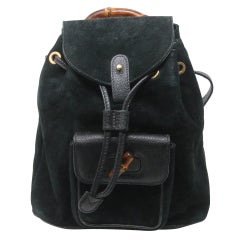 Mini mochila de ante negro con cordón de piel Bamboo de Gucci