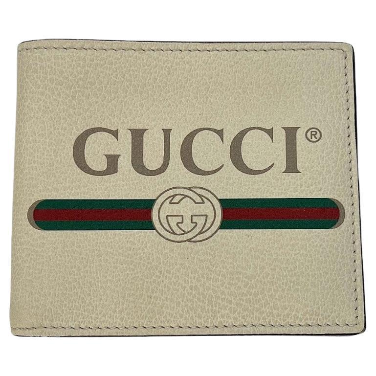 Gucci - Portefeuille bifold en cuir imprimé graphique en vente