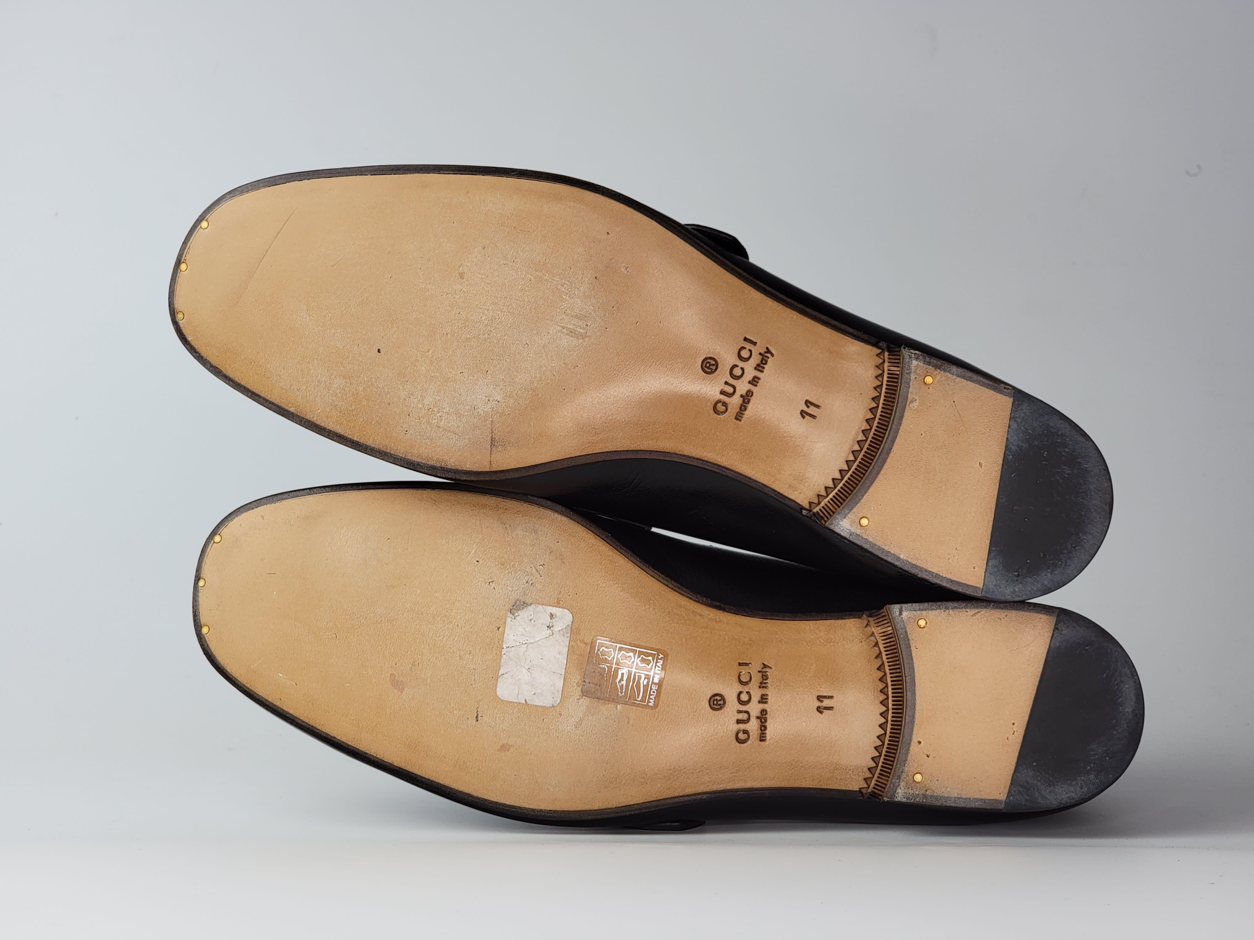 Gucci Loafers made with black leather and feature a slim shape, slightly elongated toe, silver-toned double G hardware and a leather sole. Classic shape in 1950s.

COLOR: Black
MATERIAL: Leather
ITEM CODE: 450853
SIZE: 44 EU / 11 US
HEEL: .5