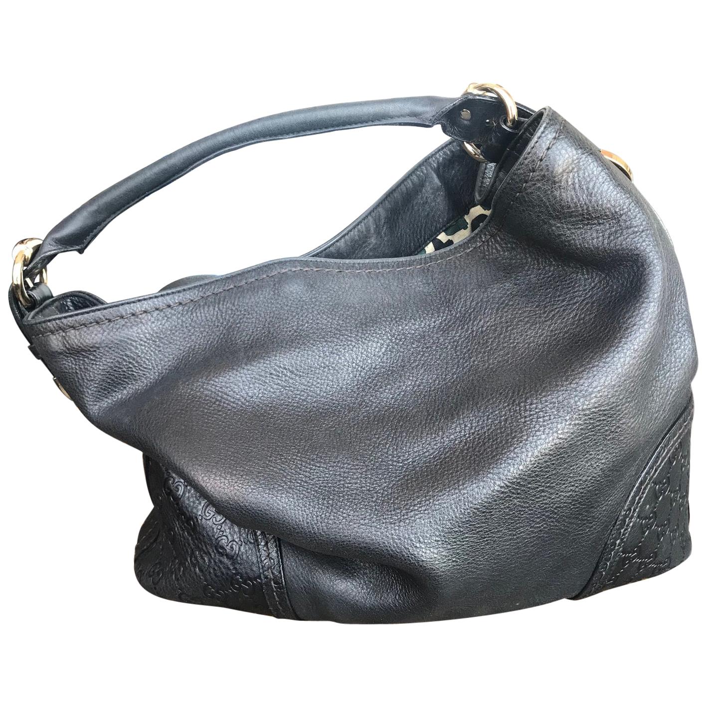 Gucci leather Monogram Embossed Shoulder Bag For Sale