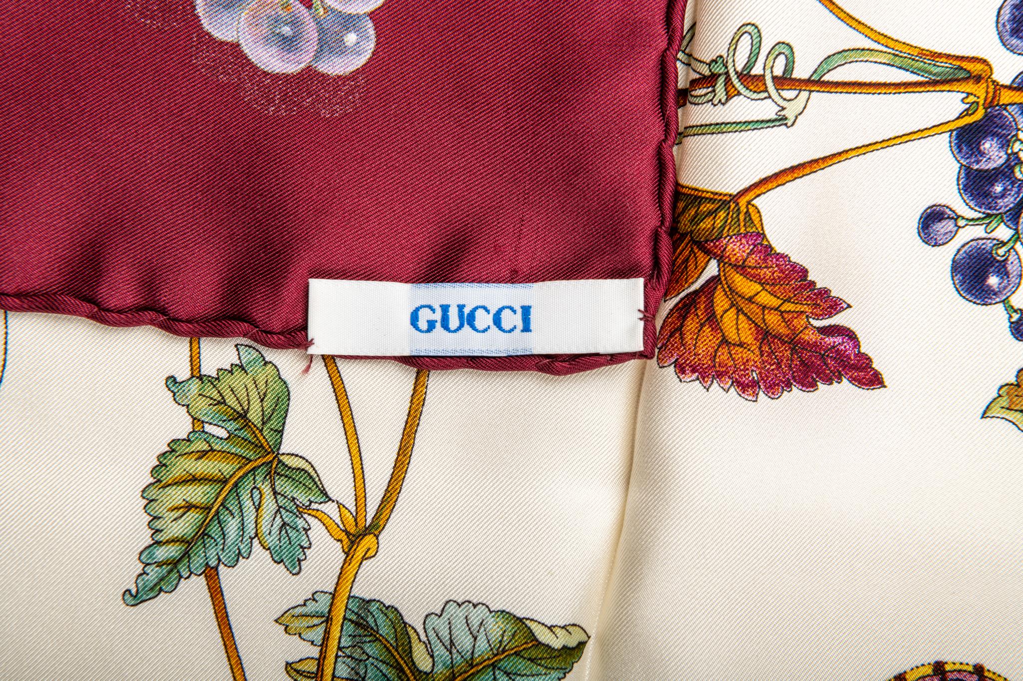 Gucci silk scarf with leaves and grapes design. Hand rolled edges.