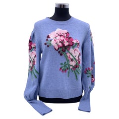 Gucci Pullover aus Wolle mit Intarsien und Blumen in Hellblau, Größe L