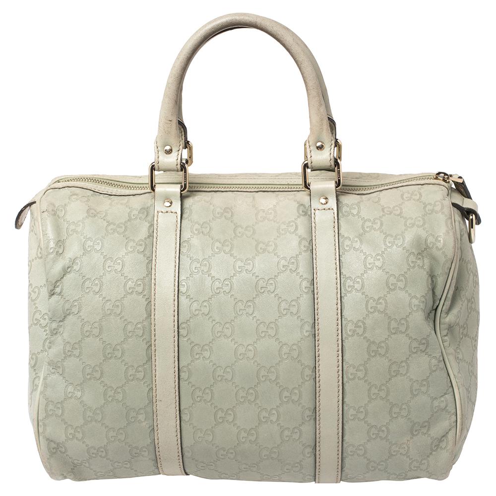 This trendy Joy Boston bag from Gucci is a buy you won't regret! Crafted from Guccissima leather, the bag has a well-sized canvas interior and two top handles for you to easily swing it. It is complete with the brand label on the front.

Includes: