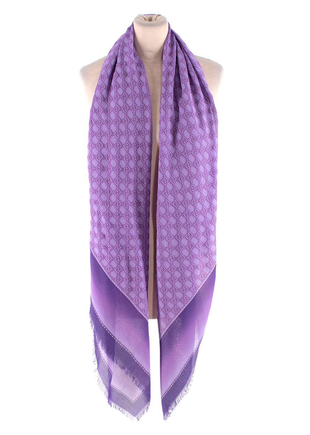 Gucci Lilac GG Monogram Wool Silk Shawl

- Lightweight soft silk and modal blend
- Signature GG monogram with gentle ombre effect and border
- Narrow fringed ends

Materials:
85% Modal
15% Silk

Made in Italy
Professional dry clean only

PLEASE