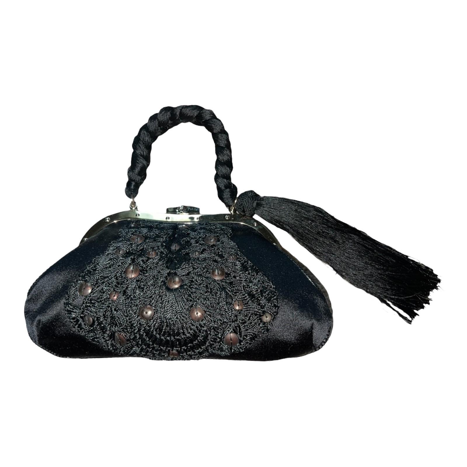 A GUCCI signature piece that will last you for many years
Timeless classic - a true beauty!
Very rare Collector's item - only very few pieces were made and sold in selected boutiques
Made of beautiful black satin fabric 
Artistic embroidery with