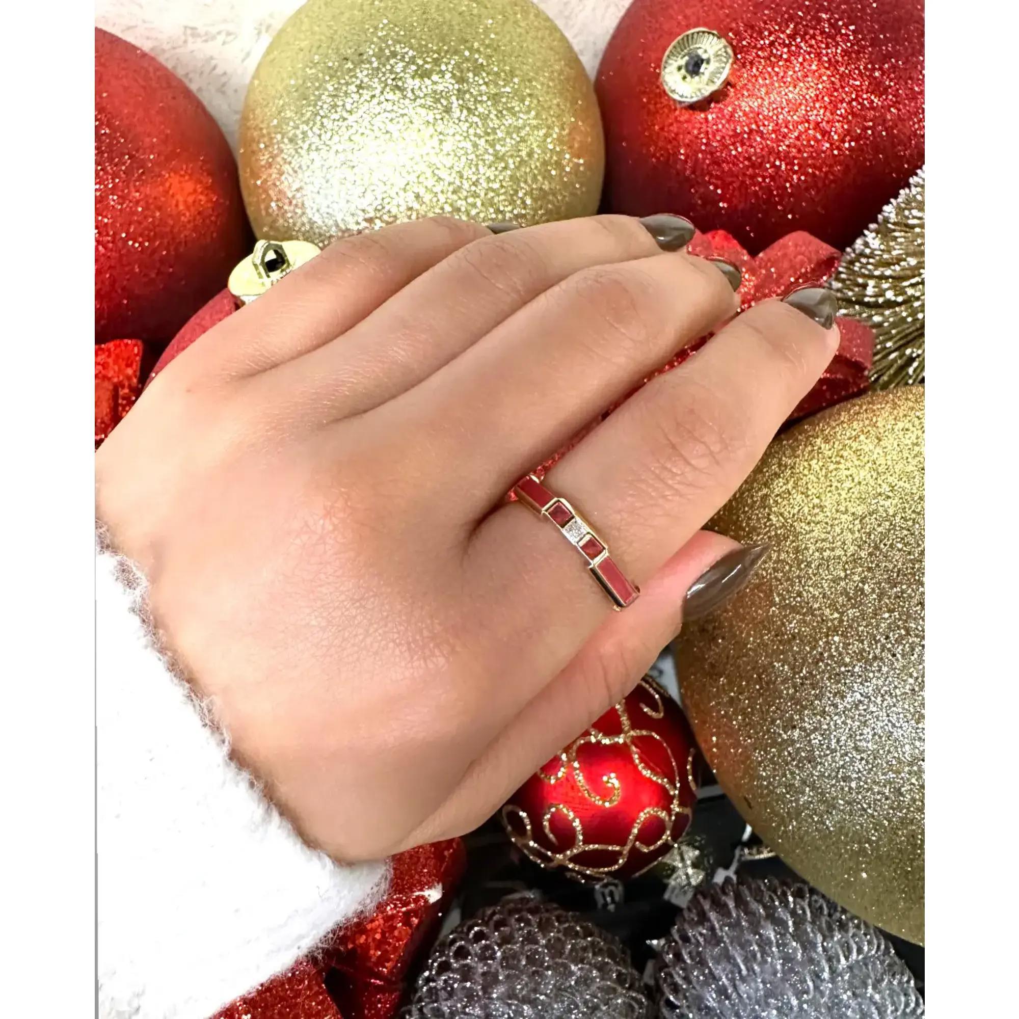 This chic GUCCI band ring is crafted in 18K Yellow Gold. The ring features an octagon shape pink enamel ring, embellished with a princess cut diamond and Gucci logo. Super stackable and quirky ring. Ring size: 7.5. Band width: 3.3mm. Total weight:
