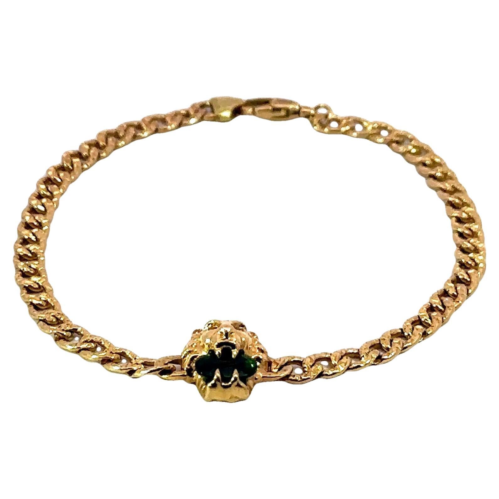 Gucci Bracelet chaîne lion avec diopside chromé en or jaune 18 carats en vente