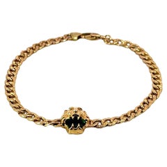 Gucci Lion Curb Chain Bracelet with Chrome Diopside Made 18 Karat Yellow Gold