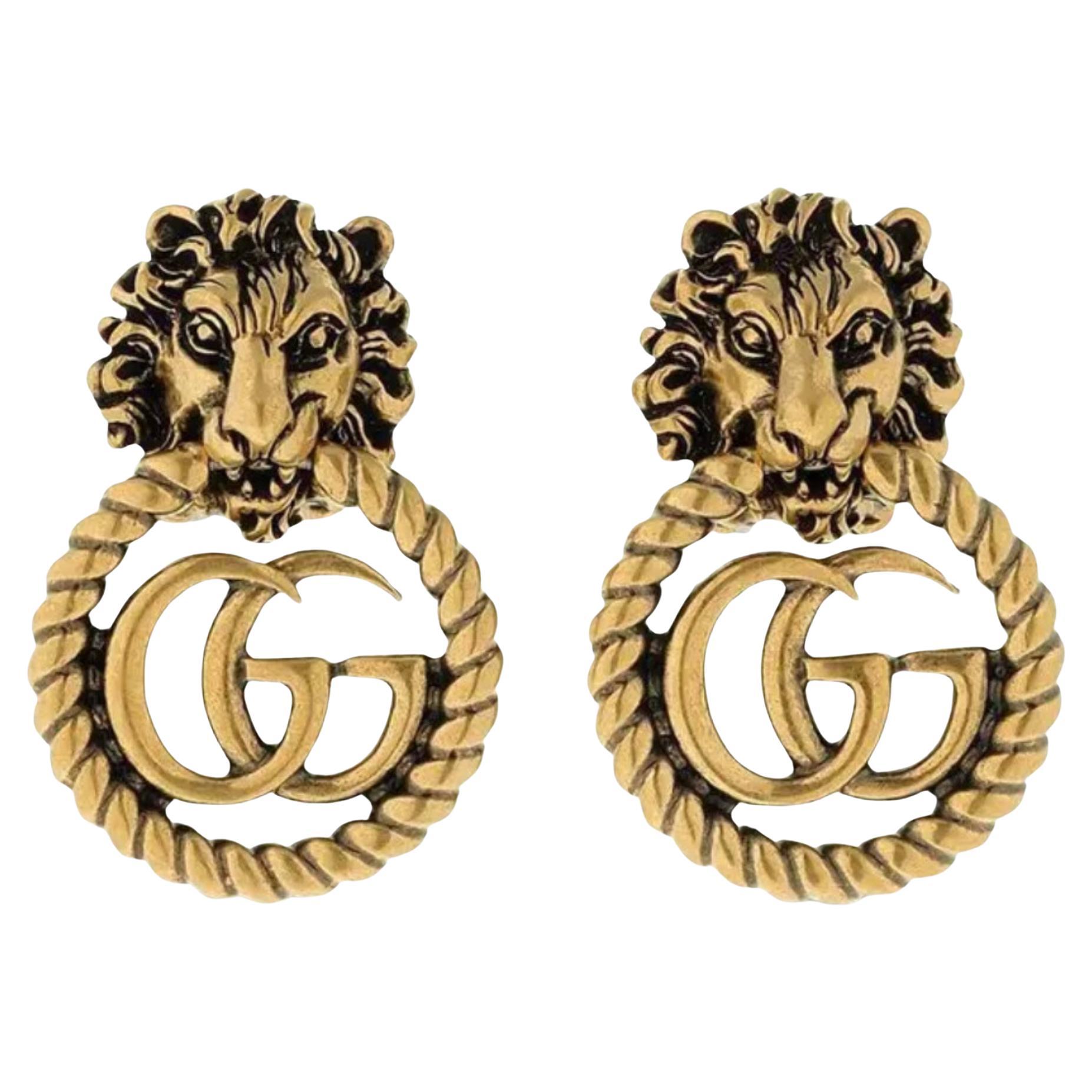 Gucci Lion Head GG Antiqued Gold Clip-on Earrings For Sale