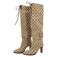 Stivali Gucci Lisa con tacco alto fino al ginocchio e monogramma GG, modello pull-on, taglia 37