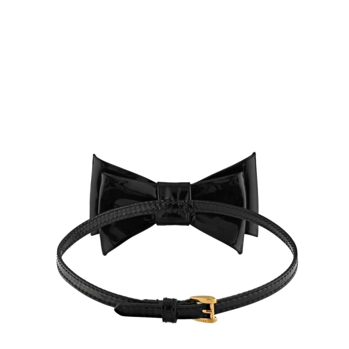 black bow tie with gold accent