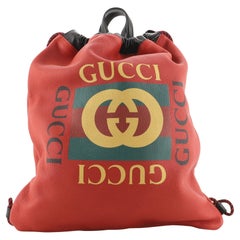 Gucci Logo Rucksack mit Kordelzug aus bedrucktem Leder Groß