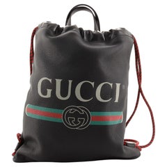 Gucci Logo Drawstring Backpack Printed Leather Medium