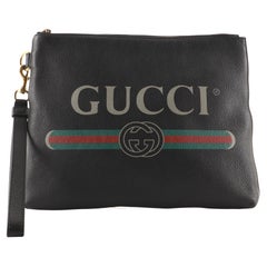 Gucci Logo Wristlet Clutch Printed Leather
