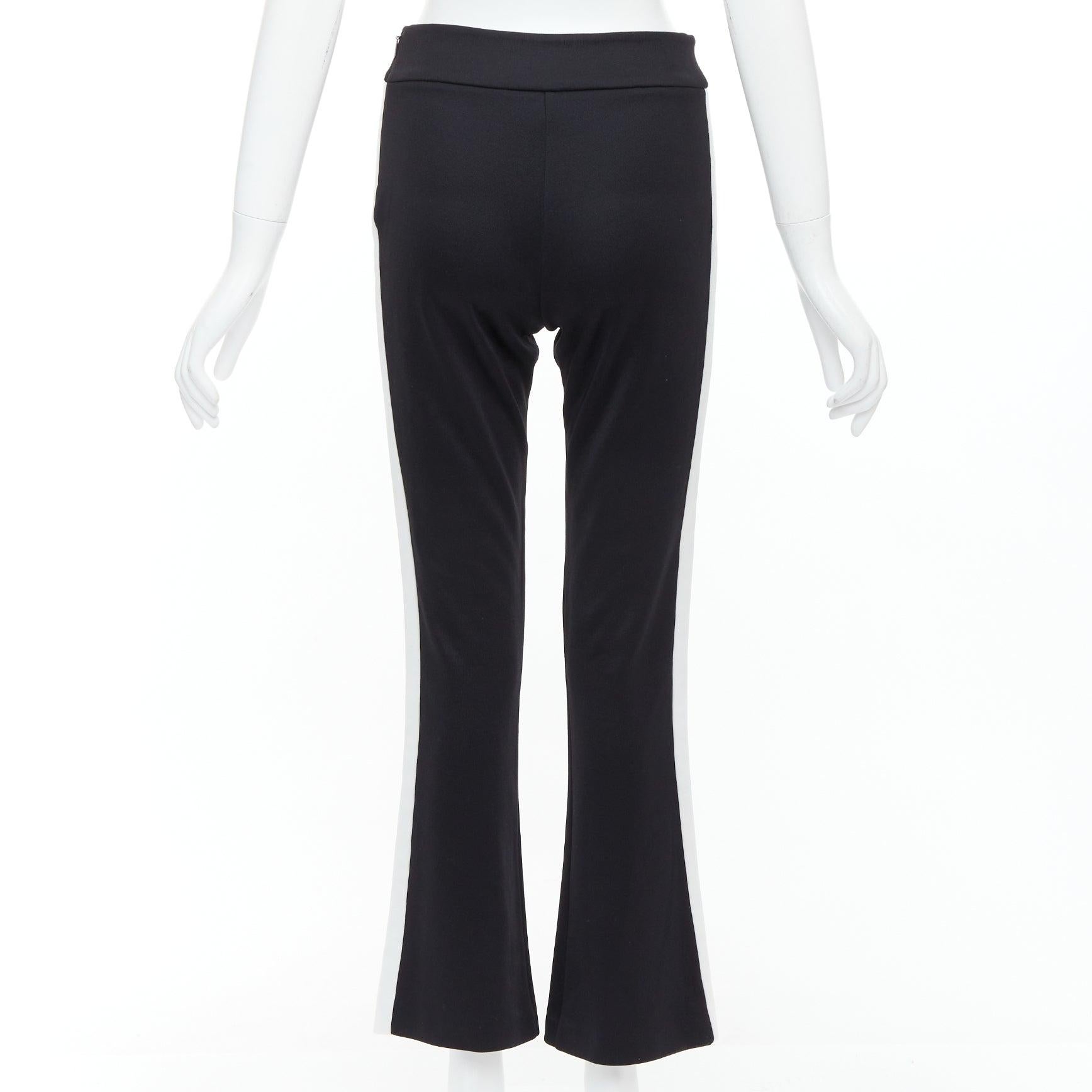GUCCI LOVED - Pantalon de survêtement évasé, brodé en rouge et passepoilé en noir Pour femmes en vente