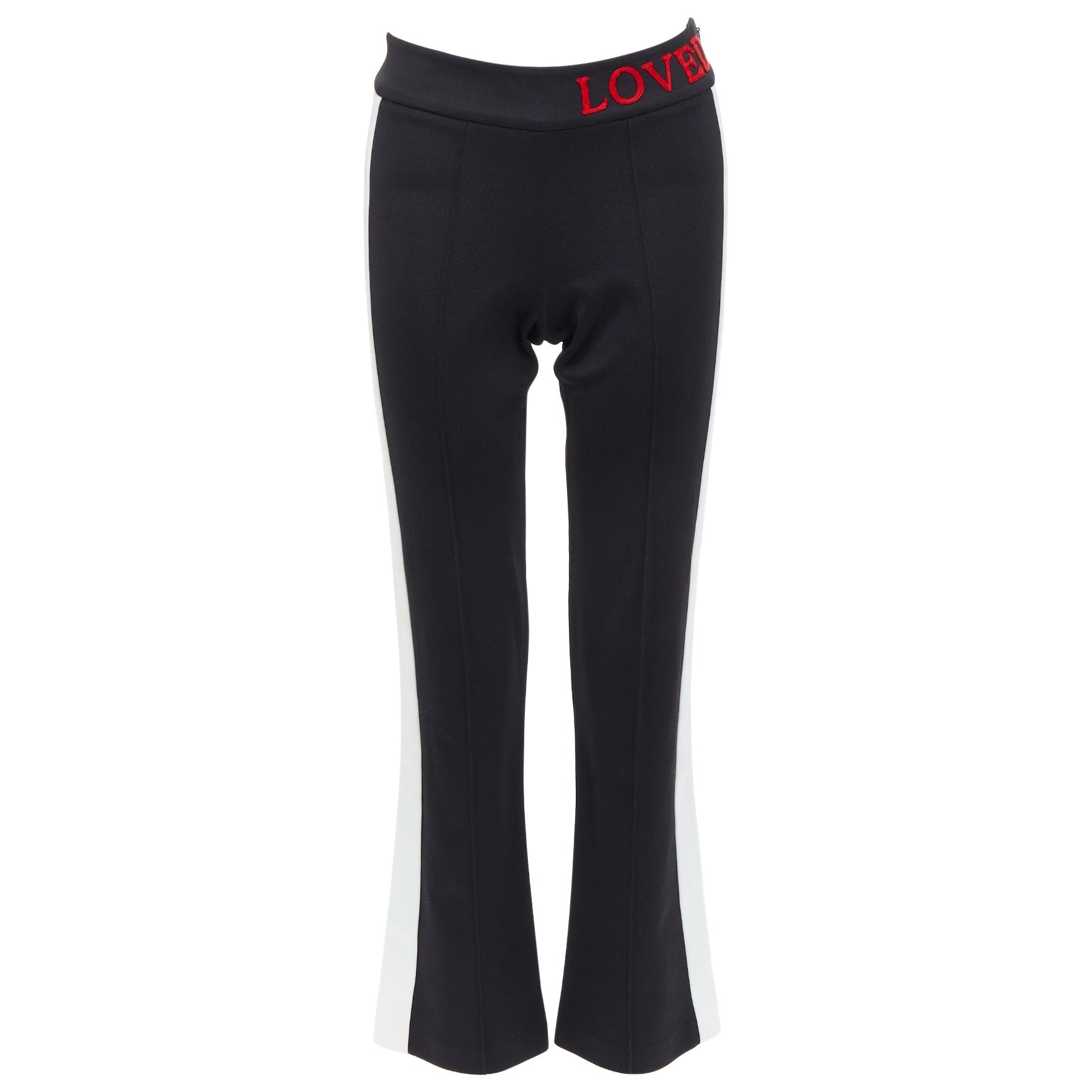 GUCCI LOVED red embroidered black piped flare track pants