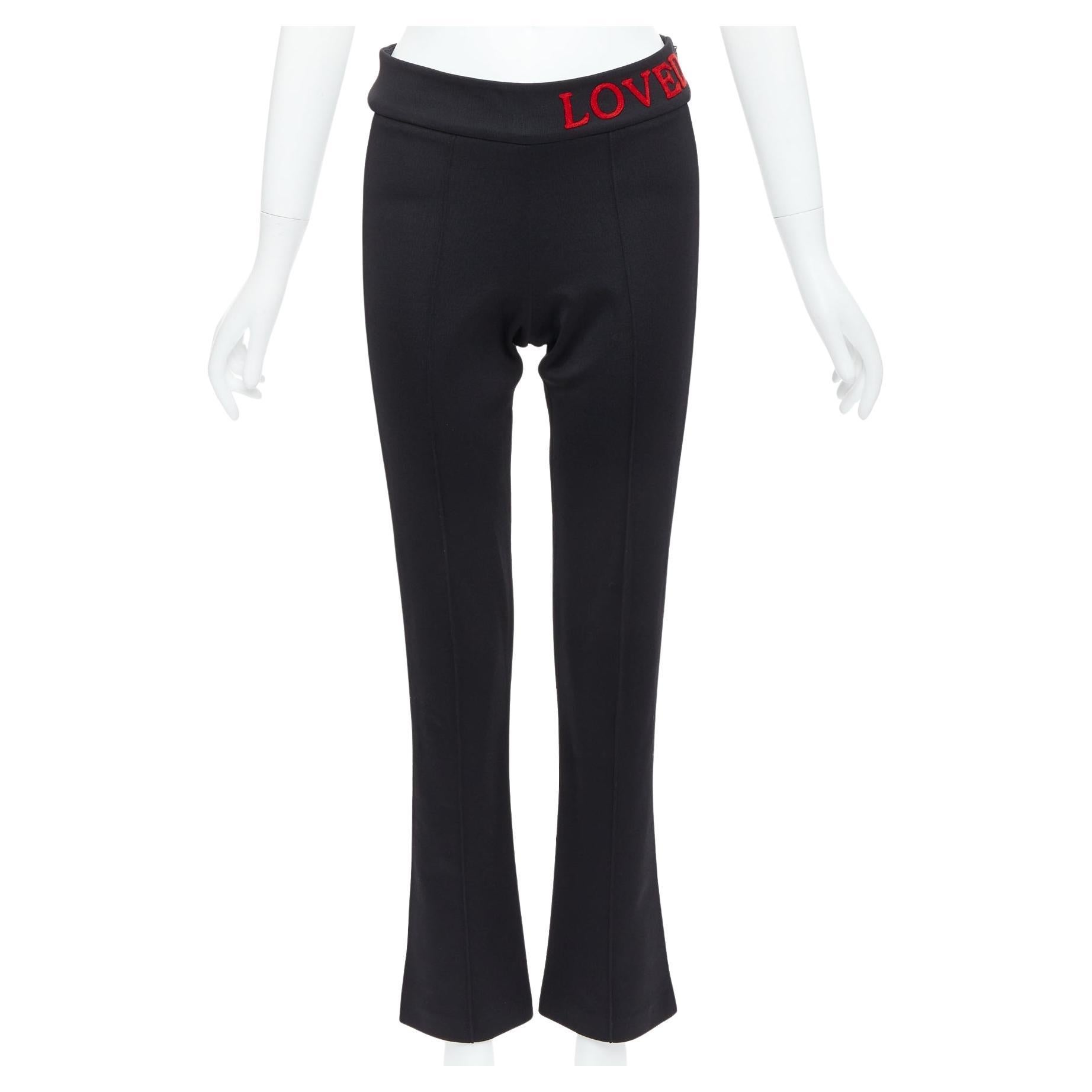 GUCCI LOVED - Pantalon de survêtement évasé, brodé en rouge et passepoilé en noir