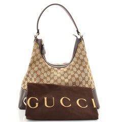 Gucci Lovely Heart Hobo GG Canvas Medium
