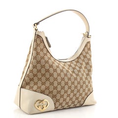 Gucci Lovely Heart Hobo GG Canvas Medium