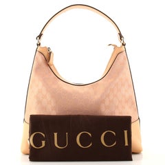 Gucci Lovely Heart Hobo GG Canvas Medium