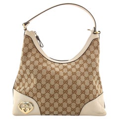 Gucci Lovely Heart Hobo GG Canvas Medium