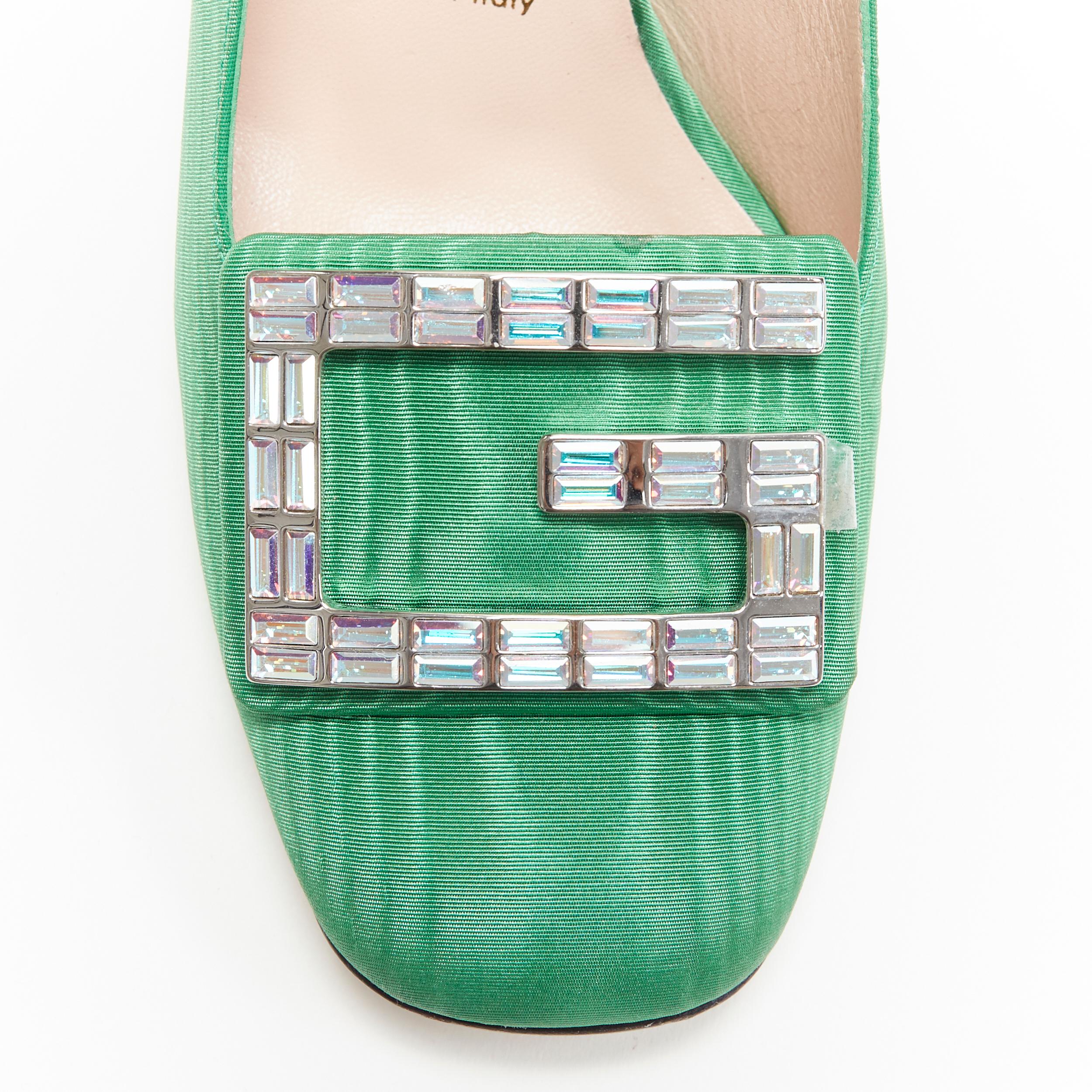 GUCCI Madelyn Moire green crystal embellished G buckle slingback mid heel EU36
Brand: Gucci
Designer: Alessandro Michele
Collection: 2020
Model Name / Style: Madelyn Moire heel
Material: Silk
Color: Green
Pattern: Solid
Closure: Sling back
Lining