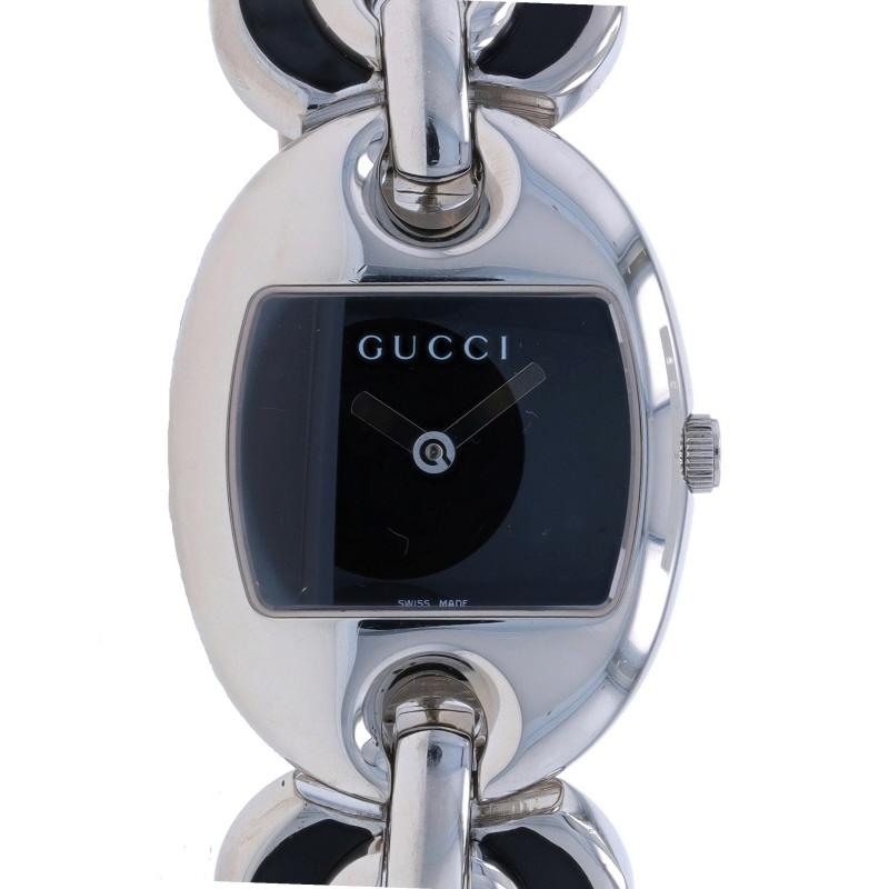 Brand: Gucci
Model: Marina Chain
Model Number: 121.5
Movement: Quartz
Number of Jewels: 4
Movement Maker: Swiss
Dial Color: Black

Metal Content: Sterling Silver

Material Information
Enamel
Color: Black

Fastening Type: Buckle Clasp with Fold-Over