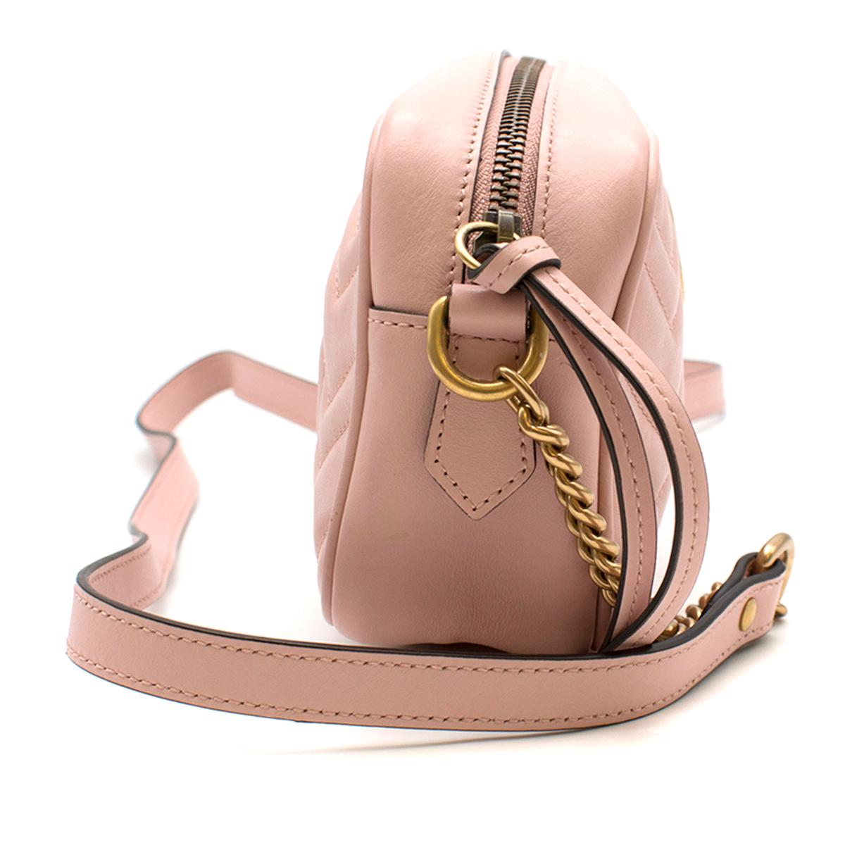 Gucci Marmont Baby Pink Matelasse Mini Camera Bag

-Baby pink, 100% leather 
-Antique gold-toned hardware
-Zip closure 
-GG embellishment
-Interior zip pocket
-Grey suede interior 

Please note, these items are pre-owned and may show some signs of
