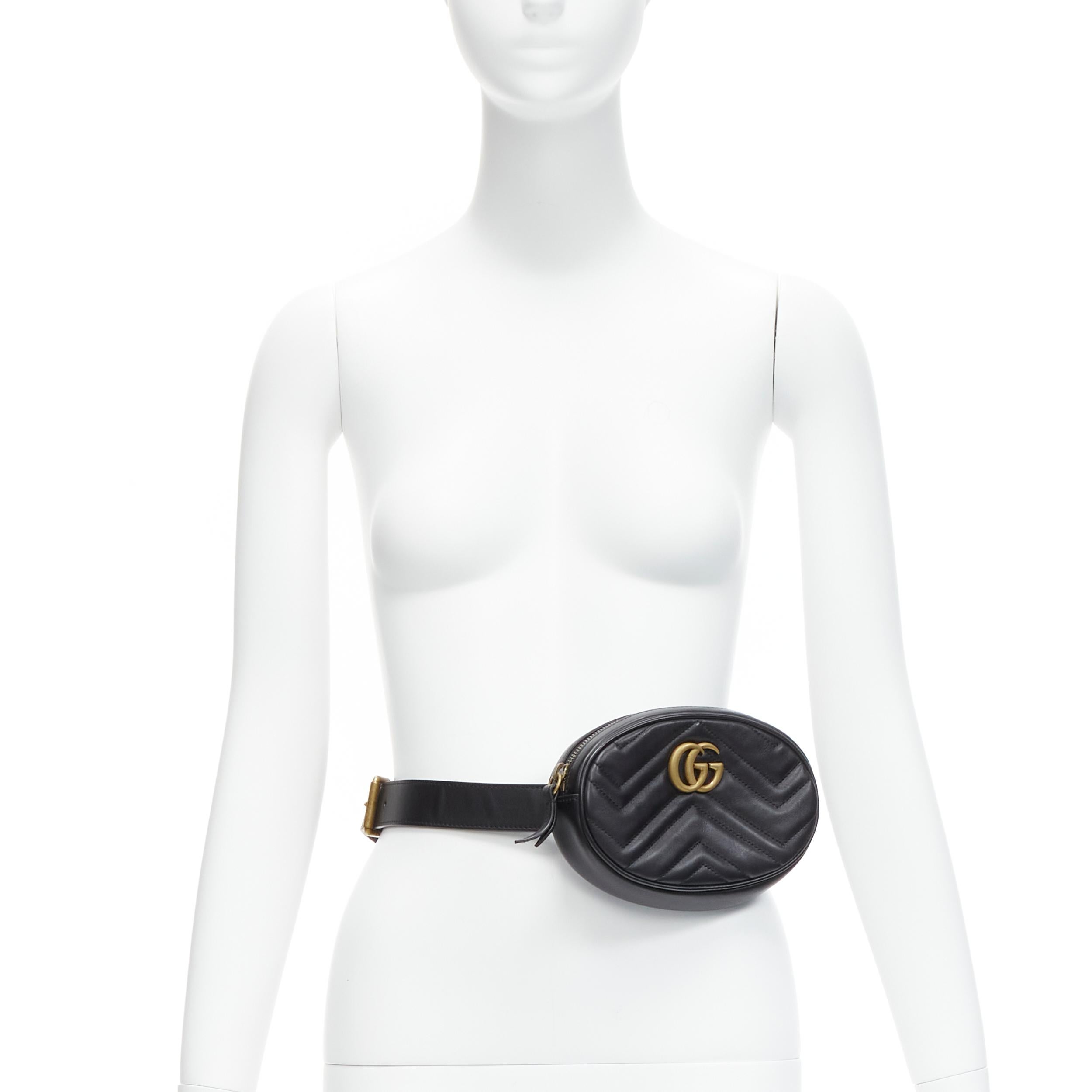 GUCCI Marmont black GG logo Matelasse leather round small belt bag
Reference: LNKO/A02134
Brand: Gucci
Collection: Marmont
Material: Leather, Metal
Color: Black, Gold
Pattern: Solid
Closure: Zip
Lining: Beige Leather
Made in: