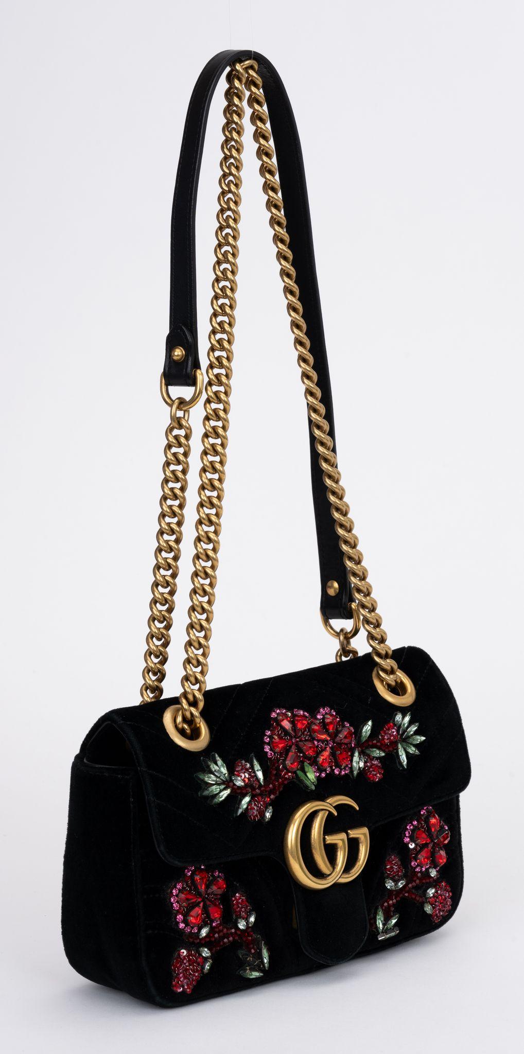 Gucci marmont preloved small, cross body or shoulder bag. Black velvet exterior with beaded embellishment representing flowers and leaves. Pink silk lining and antique gold hardware. 
Shoulder drop 12