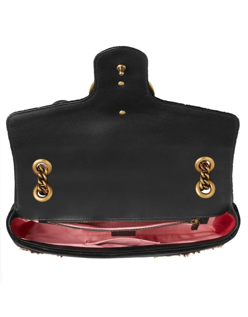 Gucci's inclusive Loved motif, embroidered with glass pearls and seed beads, ornaments the flap of a matelassé velvet bag featuring floral appliqués, a quilted heart at the back and a pull-through chain strap for hand carry or over-the-shoulder