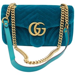 Gucci Marmont GG handbag in blue / green velvet.