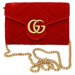 Gucci Marmont GG handbag in red velvet and gold finishes