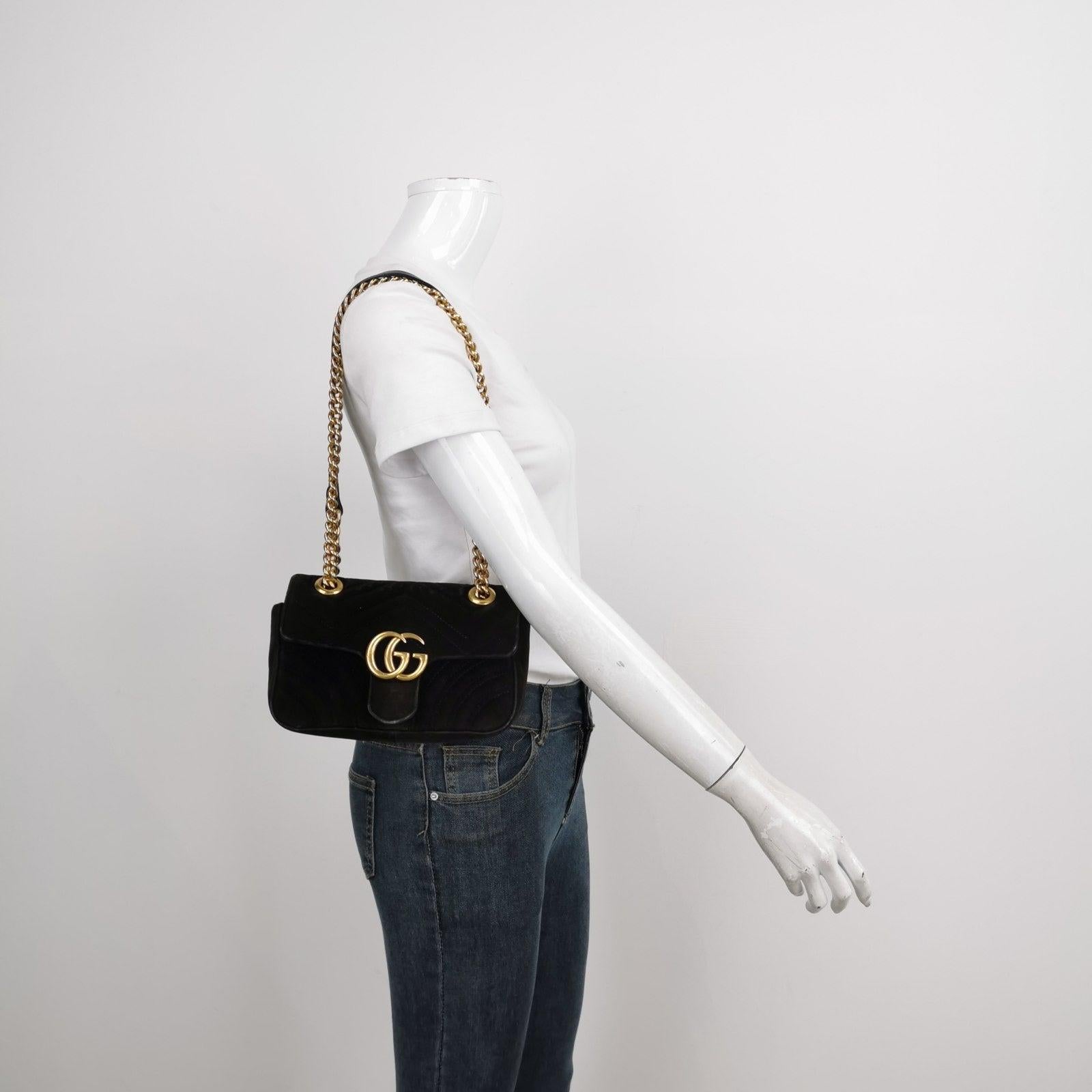 Gucci Marmont Mini Black Velvet Camera Bag These are professional photos of the actual bag offered by Luxbags. The Gucci Marmont Bag is a timeless and adaptable accessory designed by the renowned brand Gucci. Its signature V-shaped chevron stitching