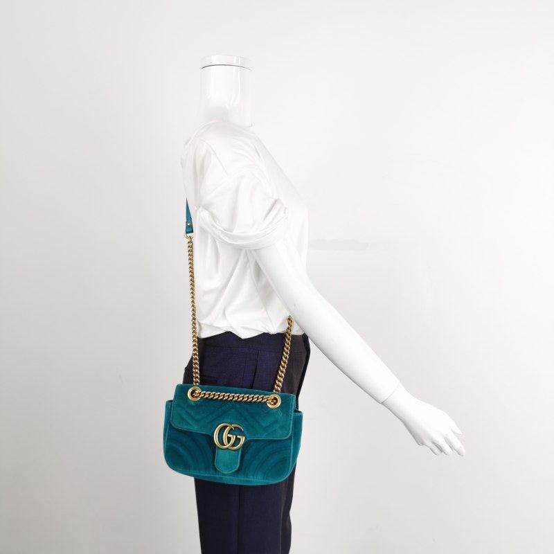 Gucci Marmont Mini Flap Blue Velvet Handbag
 These are professional photos of the actual bag offered by Luxbags.
 The Gucci Marmont Mini Flap Pink Velvet Crossbody Bag is a timeless and adaptable accessory designed by the renowned brand Gucci. Its
