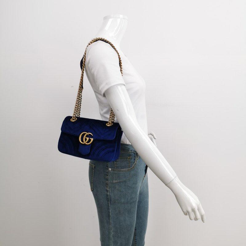 Gucci Marmont Mini Flap Navy Velvet Handbag
 These are professional photos of the actual bag offered by Luxbags.
 The Gucci Marmont Mini Flap Pink Velvet Crossbody Bag is a timeless and adaptable accessory designed by the renowned brand Gucci. Its