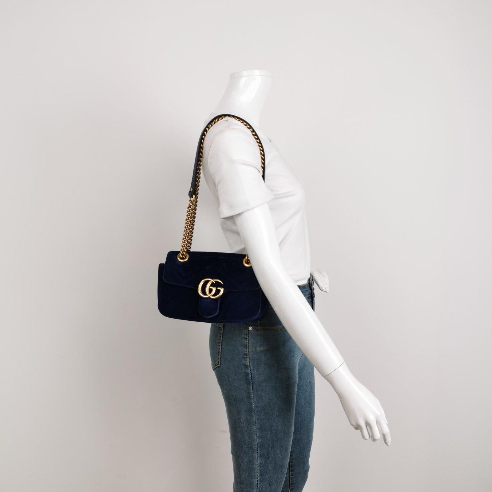 Gucci Marmont Mini Flap Navy Velvet Handbag These are professional photos of the actual bag offered by Luxbags. The Gucci Marmont Mini Flap Pink Velvet Crossbody Bag is a timeless and adaptable accessory designed by the renowned brand Gucci. Its