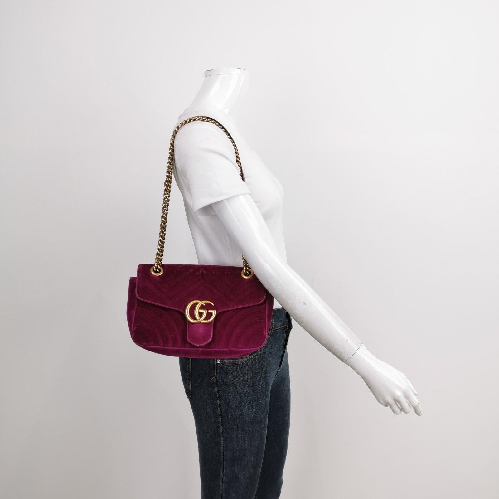 Gucci Marmont Mini Flap Pink Velvet Handbag These are professional photos of the actual bag. 
 
 The Gucci Marmont Mini Flap Pink Velvet Crossbody Bag is a timeless and adaptable accessory designed by the renowned brand Gucci. Its signature V-shaped