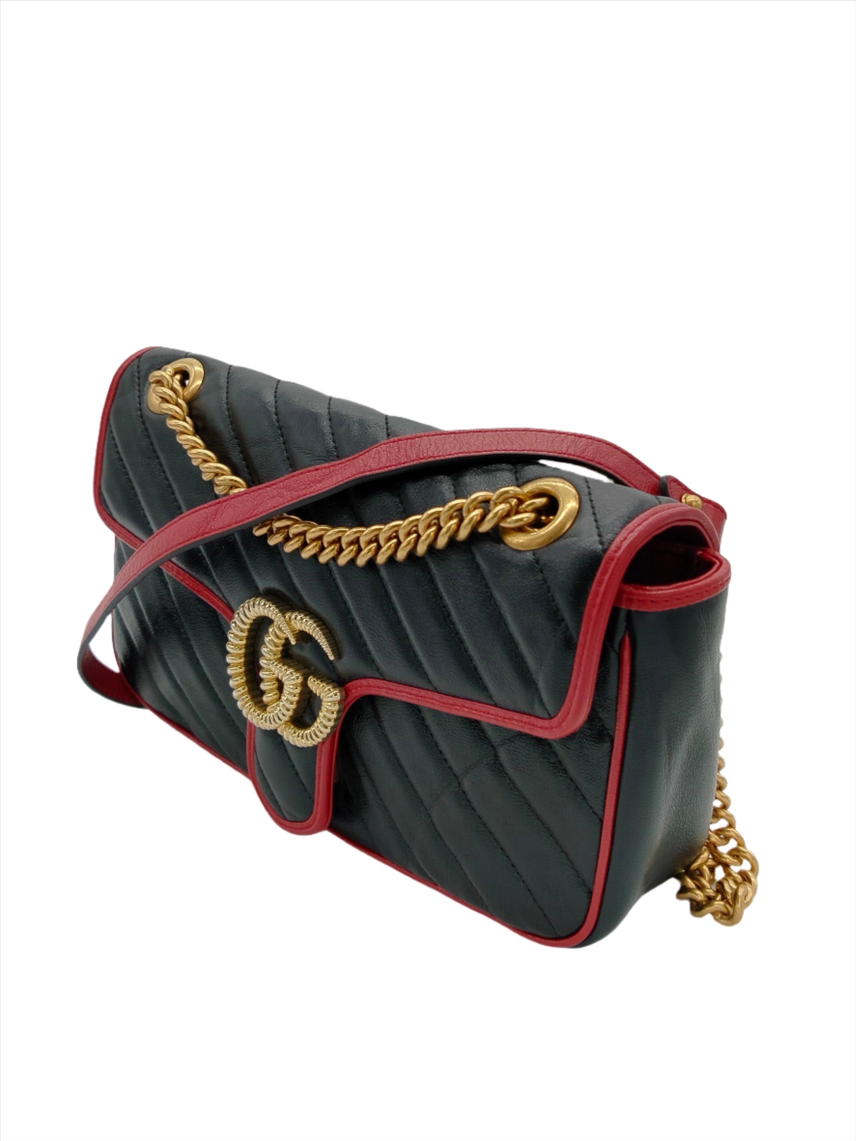 The GG Marmont Small Chevron Leather Bag is a chic and stylish option for everyday wear. The zigzag quilted leather design is eye-catching and unique, while the double GG logo featured on the front flap adds a touch of luxury. This classic black