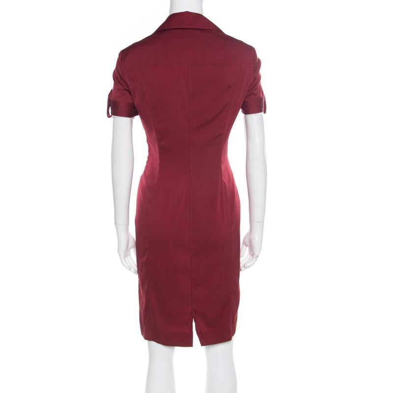 Opt for a Gucci dress if you are looking for a luxurious and urbane look! This maroon dress is made of a silk blend and features a form-fitting design. It flaunts a plunging neckline with a self-tie detailing and short sleeves. It will look amazing