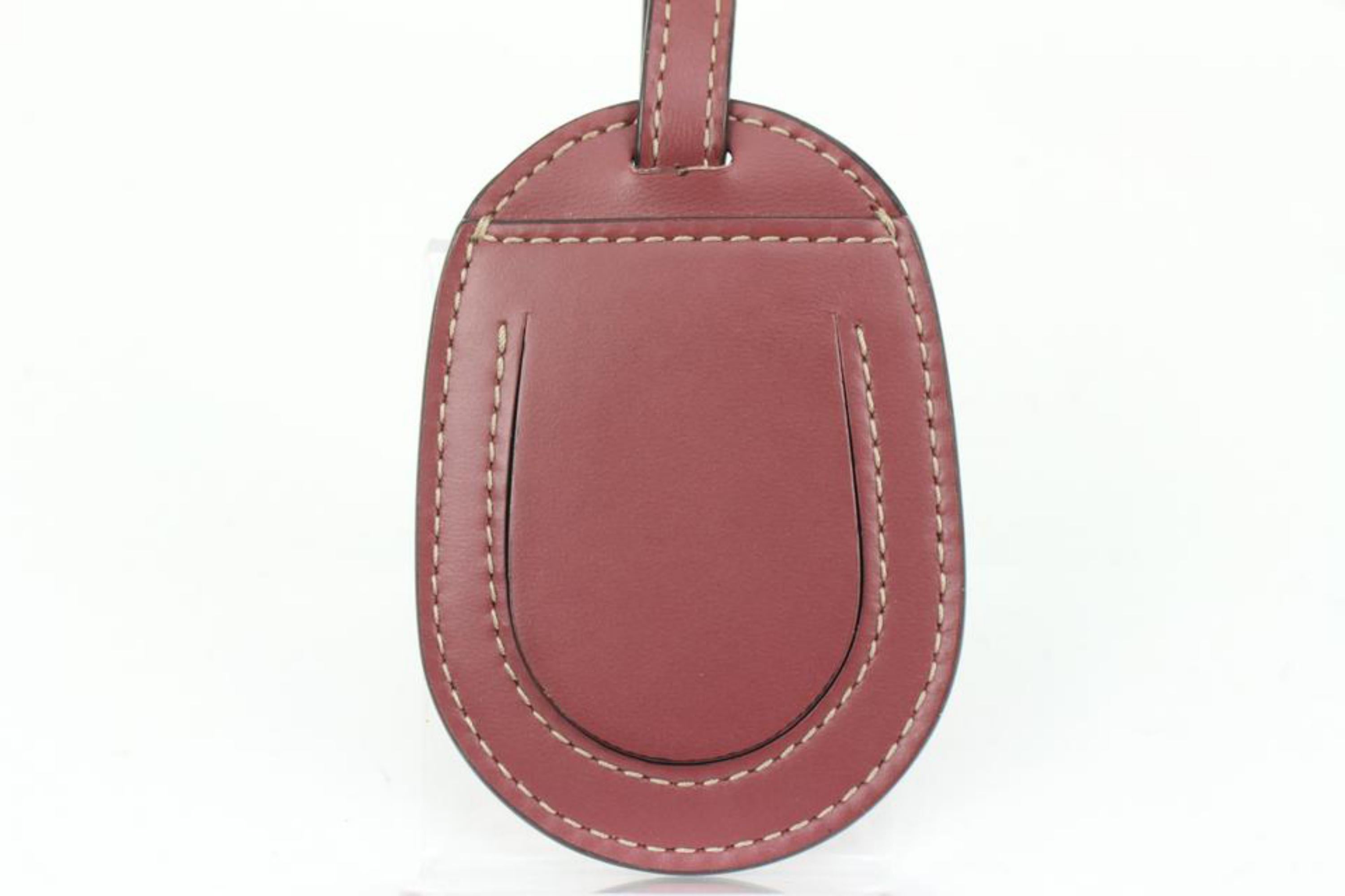 Étiquette de bagage Gucci Mauve Clochette de sac fourre-tout réversible Supreme GG s330g21 en vente 1