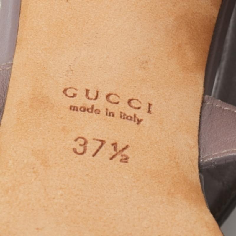 When considering Gucci, two words come to mind: luxurious and iconic. These gorgeous sandals are crafted from mauve leather, and the gladiator caged silhouette is adorned with carefully placed studs. They are complete with open toes and come with