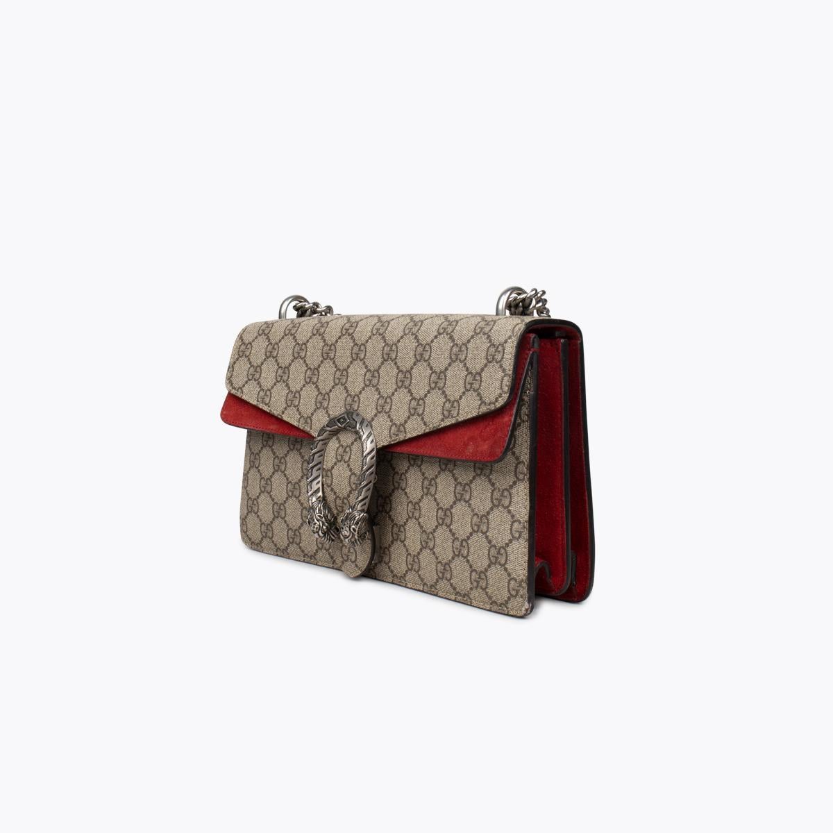 Gucci Medium GG Supreme Dionysus Shoulder Bag

- Neutrals Coated Canvas
- GG Supreme & Dionysus Accent
- Antiqued Silver-Tone Hardware
- Chain-Link Shoulder Strap
- Chain-Link Accents & Dual Exterior Pockets
- Suede Lining
- Push-Lock Closure at