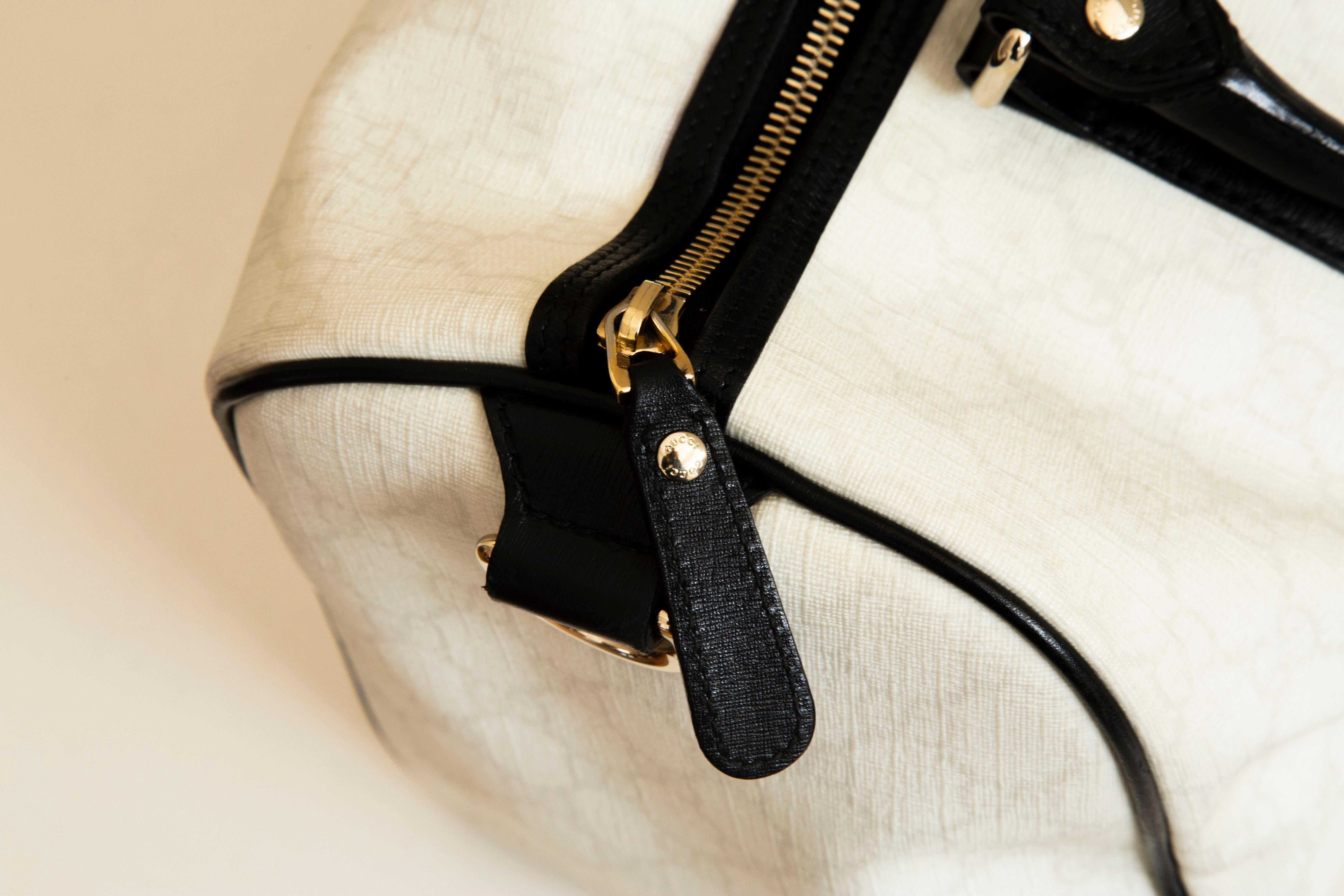 Gucci Medium Joy Boston Bag in White GG Coated Canvas & Black Leather Trim For Sale 6