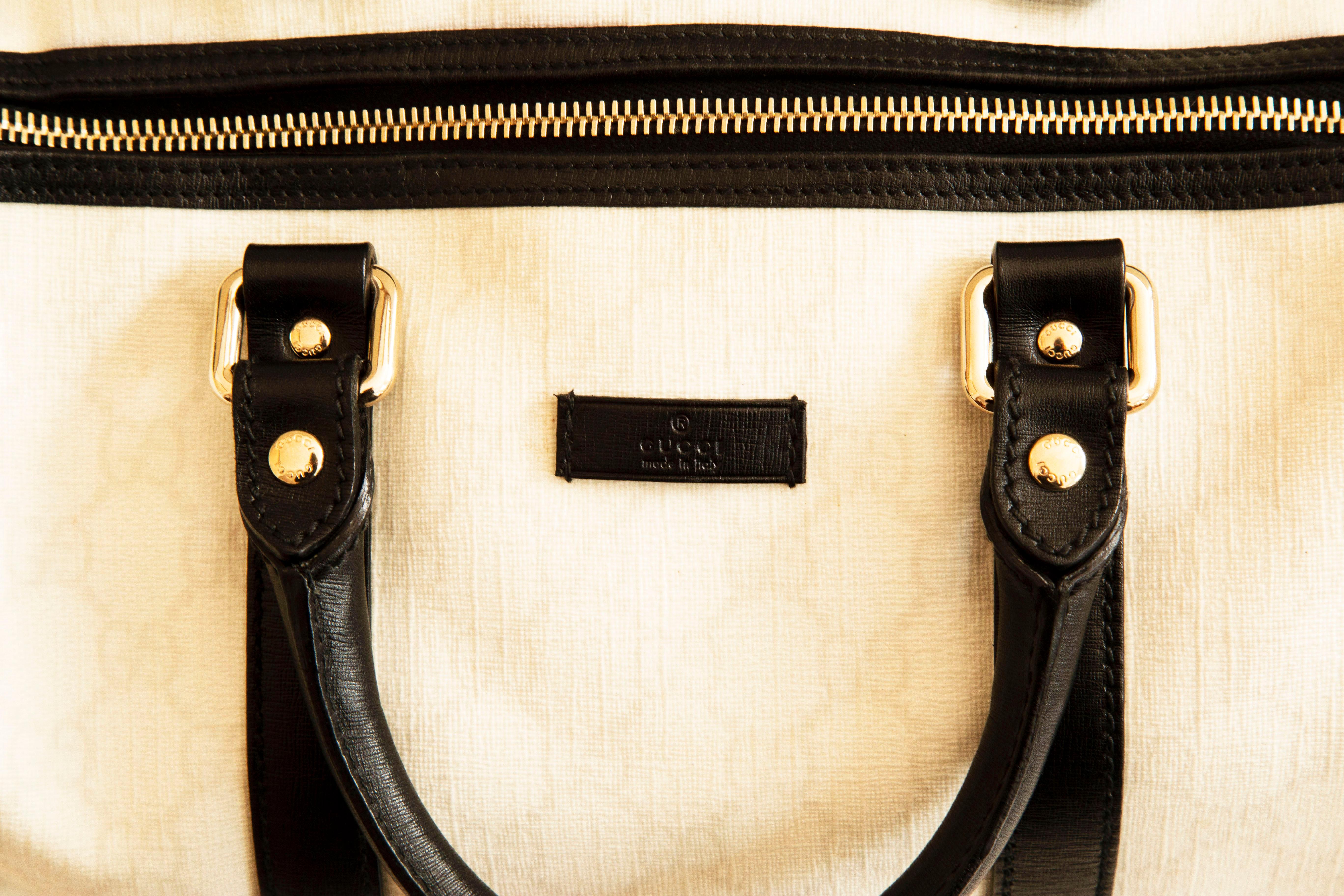 Gucci Medium Joy Boston Bag in White GG Coated Canvas & Black Leather Trim For Sale 8