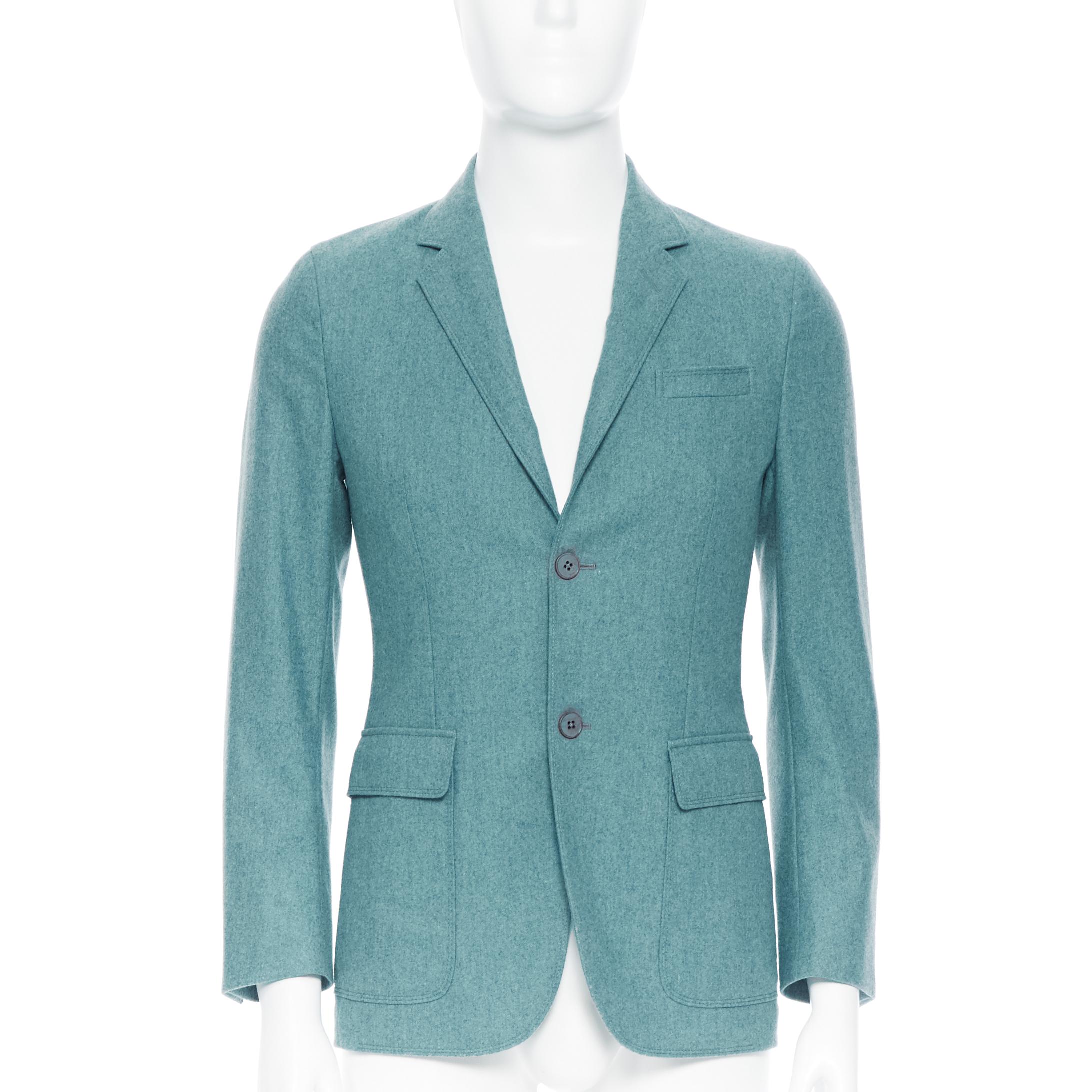 GUCCI men green blue patch pocket single-breast soft tailor blazer jacket EU44 Reference: CC/GEHI00303 
Brand: Gucci 
Material: Wool 
Color: Green 
Pattern: Solid 
Extra Detail: Blazer jacket. Notch lapels. 2 patch pockets and a slash pocket. 
Made