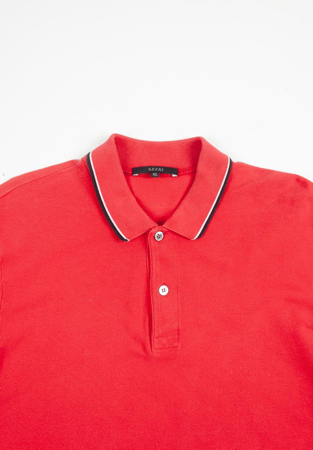 100% genuine Gucci Men Polo, S649 
Color: red
(An actual color may a bit vary due to individual computer screen interpretation)
Material: 100% cotton
Tag size: XL runs slim or better L
This polo shirt is great quality item. Rate 8 of 10, very good