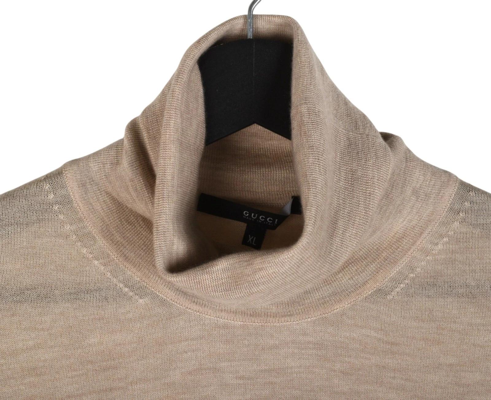 Check my other listings. Have many more designer clothes for sale. Open to any offers.

Item for sale is 100% genuine Gucci turtleneck Men Sweater, S1363, PE9
Color: beige
(An actual color may a bit vary due to individual computer screen